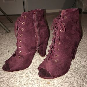 Purple lace up open toed block heel booties
